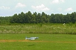 Chris Gator Shepherd's C6 plans Mustang on final - photo by Rocks