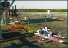 A line-up of planes at the Newport News Park R/C Club flying field - Dec 99