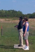 Larry, in shorts, and Owen try out Larry's new plane